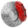 Drilled steel brake disc with a red brake caliper