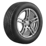 Black vehicle tyre on a chrome alloy wheel